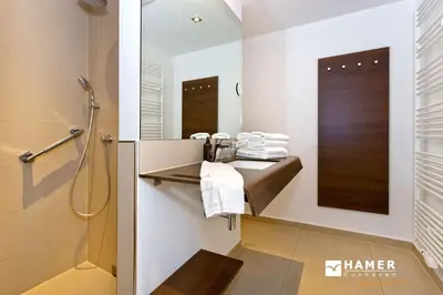 Ein Badezimmer in der Unterkunft Duhner Strandhus, S12