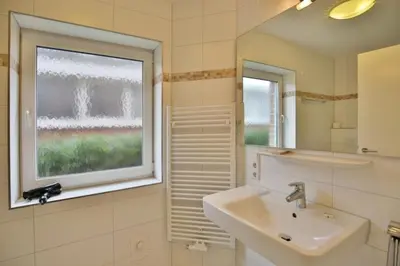 Ein Badezimmer in der Unterkunft Dunamar, DM4