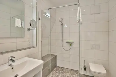 Ein Badezimmer in der Unterkunft Admiralsgarten, AG14b