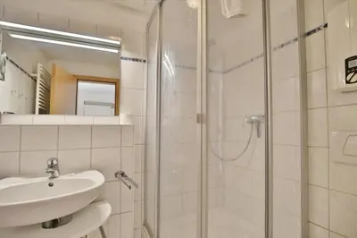 Ein Badezimmer in der Unterkunft Duhner Brise, DB6