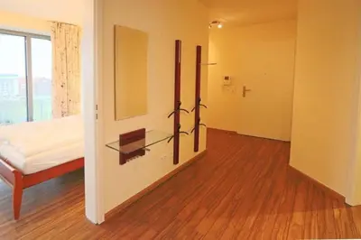 Ein Bett oder Betten in einem Zimmer der Unterkunft Residenz am Yachthafen, RY24