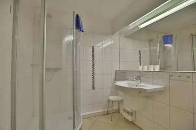 Ein Badezimmer in der Unterkunft Hohe Worth, H111