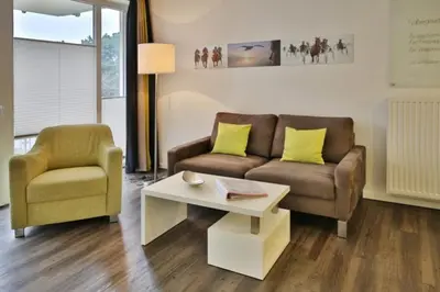Ein Sitzbereich in der Unterkunft Duhner Strandhus, S204
