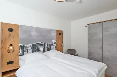 Ein Bett oder Betten in einem Zimmer der Unterkunft Nordstrand, N304