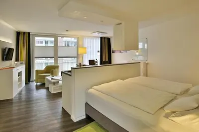Ein Bett oder Betten in einem Zimmer der Unterkunft Duhner Strandhus, S108