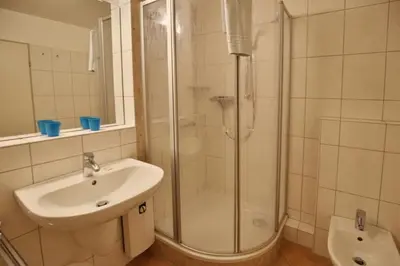 Ein Badezimmer in der Unterkunft Hohe Worth, H104
