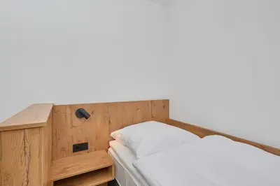 Ein Bett oder Betten in einem Zimmer der Unterkunft Nordstrand, N303