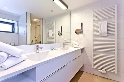 Ein Badezimmer in der Unterkunft Alte Liebe, RA304