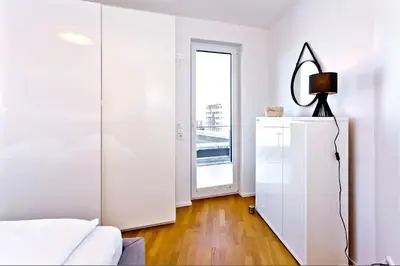 Ein Bett oder Betten in einem Zimmer der Unterkunft City Marina, CM18-7