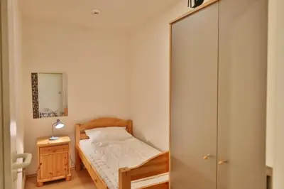Ein Bett oder Betten in einem Zimmer der Unterkunft Stranddüne, D9