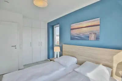 Ein Bett oder Betten in einem Zimmer der Unterkunft City Marina, CM16c