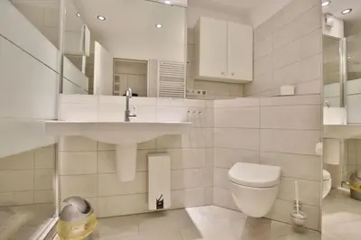Ein Badezimmer in der Unterkunft Hohe Worth, H309
