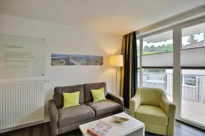 Ein Sitzbereich in der Unterkunft Duhner Strandhus, S103