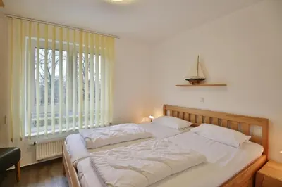 Ein Bett oder Betten in einem Zimmer der Unterkunft Rugenbarg, RR4