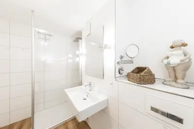 Ein Badezimmer in der Unterkunft Hohe Worth, H305