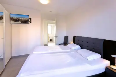 Ein Bett oder Betten in einem Zimmer der Unterkunft City Marina, CM18-1