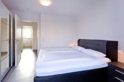 Ein Bett oder Betten in einem Zimmer der Unterkunft City Marina, CM18-2