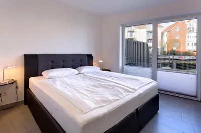 Ein Bett oder Betten in einem Zimmer der Unterkunft City Marina, CM18-2