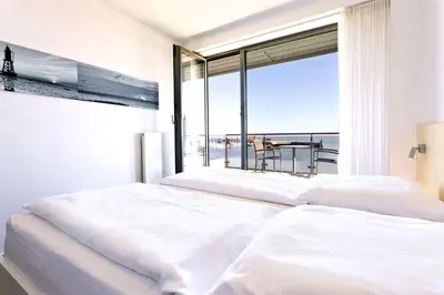 Ein Bett oder Betten in einem Zimmer der Unterkunft Alte Liebe, RA200