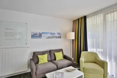 Ein Sitzbereich in der Unterkunft Duhner Strandhus, S3