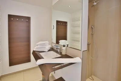 Ein Badezimmer in der Unterkunft Duhner Strandhus, S3
