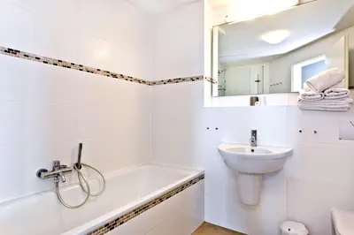 Ein Badezimmer in der Unterkunft Residenz am Yachthafen, RY7