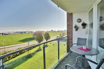 Ein Balkon oder eine Terrasse in der Unterkunft Nordseeblick, NB3