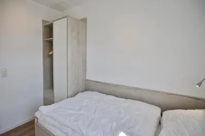 Ein Bett oder Betten in einem Zimmer der Unterkunft Windjammer, WJ10