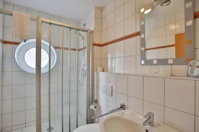 Ein Badezimmer in der Unterkunft Nordseeblick, NB10