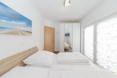 Ein Bett oder Betten in einem Zimmer der Unterkunft Admiralsgarten, AG16b