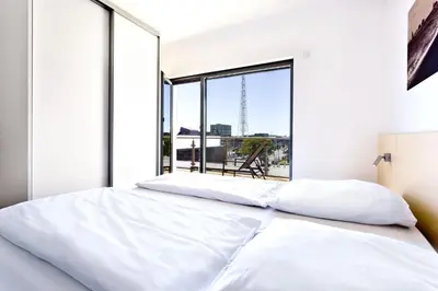 Ein Bett oder Betten in einem Zimmer der Unterkunft Alte Liebe, RA308