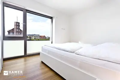 Ein Bett oder Betten in einem Zimmer der Unterkunft Alte Liebe, RA113