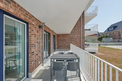 Ein Balkon oder eine Terrasse in der Unterkunft Nordstrand, N102