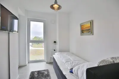 Ein Bett oder Betten in einem Zimmer der Unterkunft Kapitän Alexander, KA47