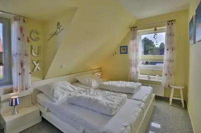 Ein Bett oder Betten in einem Zimmer der Unterkunft Bernstein, BS5
