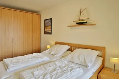 Ein Bett oder Betten in einem Zimmer der Unterkunft Am Seedeich 14, AS5
