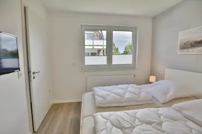 Ein Bett oder Betten in einem Zimmer der Unterkunft Meine See, MS7