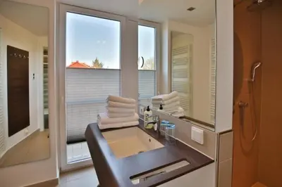 Ein Sitzbereich in der Unterkunft Duhner Strandhus, S202