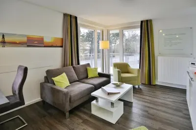 Ein Sitzbereich in der Unterkunft Duhner Strandhus, S101