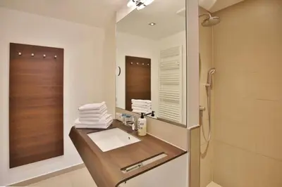 Ein Badezimmer in der Unterkunft Duhner Strandhus, S101