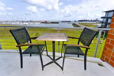 Ein Balkon oder eine Terrasse in der Unterkunft Residenz am Yachthafen, RY9
