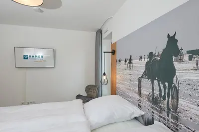 Ein Bett oder Betten in einem Zimmer der Unterkunft Nordstrand, N101a