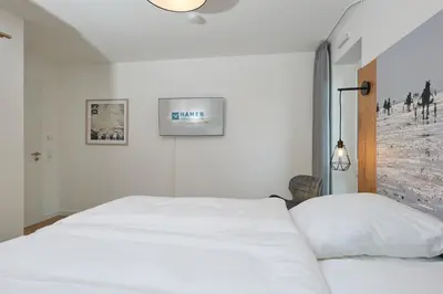 Ein Bett oder Betten in einem Zimmer der Unterkunft Nordstrand, N101a