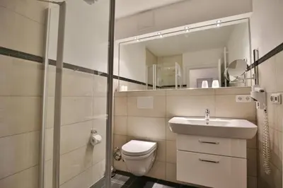 Ein Badezimmer in der Unterkunft Rugenbarg, RR5