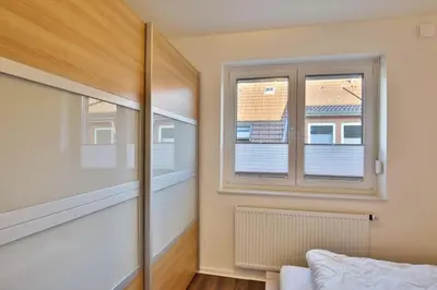 Ein Bett oder Betten in einem Zimmer der Unterkunft Ruge Bries, RB4