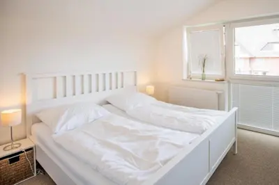 Ein Bett oder Betten in einem Zimmer der Unterkunft Ferienhaus 