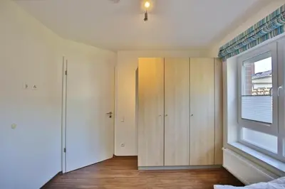 Ein Bett oder Betten in einem Zimmer der Unterkunft Wattwagen, RW1