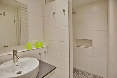 Ein Badezimmer in der Unterkunft Admiralsgarten, AG2s