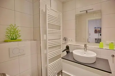 Ein Badezimmer in der Unterkunft Admiralsgarten, AG2s