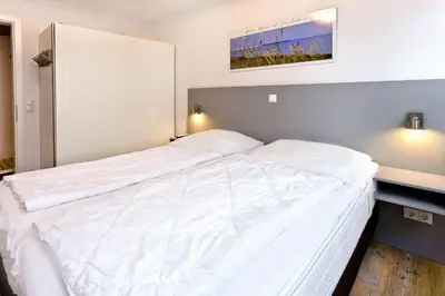 Ein Bett oder Betten in einem Zimmer der Unterkunft Admiralsgarten, AG2s